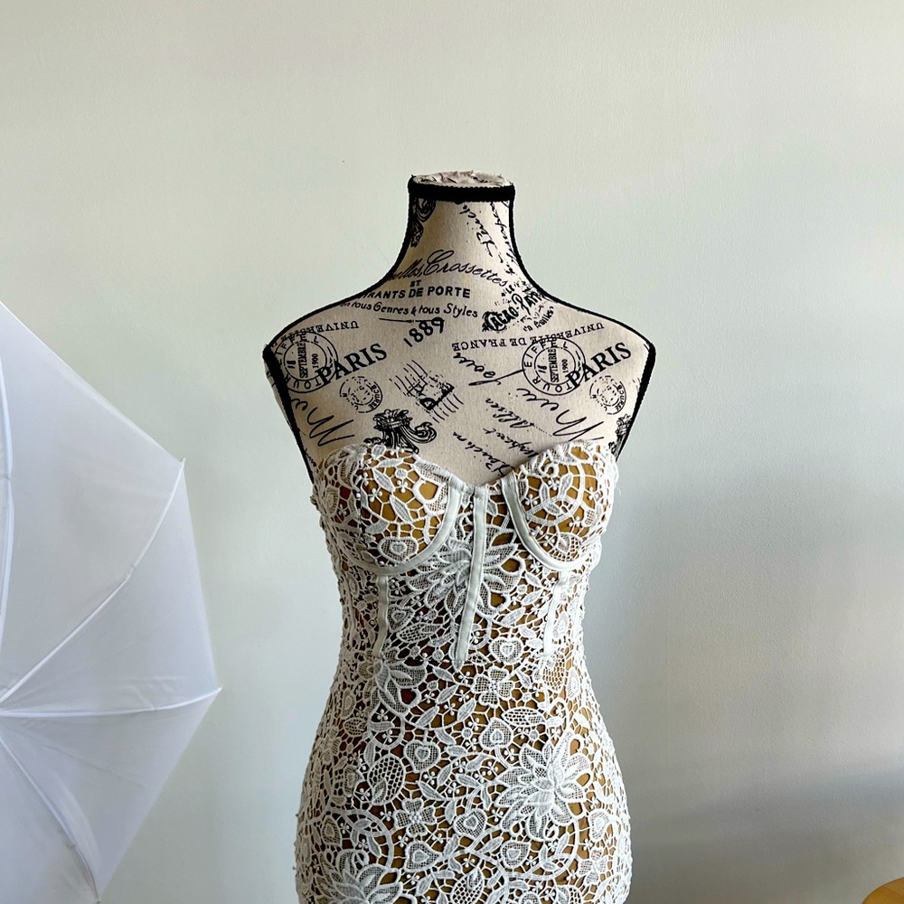 Beautiful White dress by Miss Circle with a nude cover fabric under. A gem!